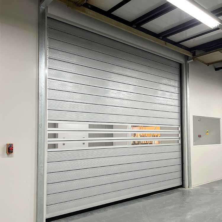 High speed spiral door
